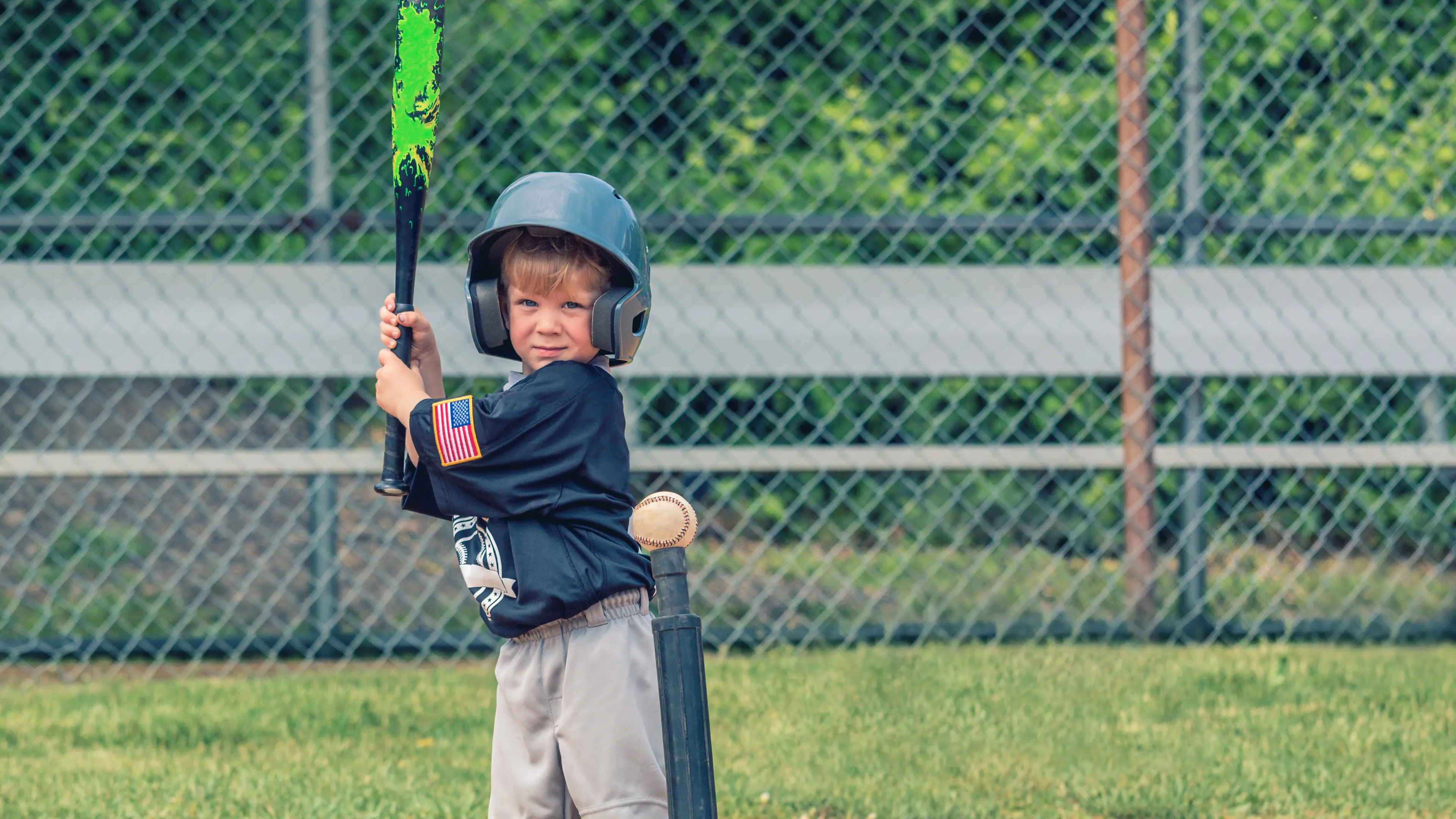 Child playing T-Ball