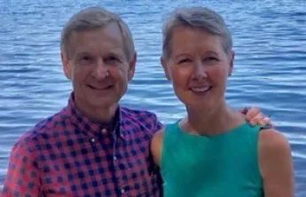 Couple standing by water